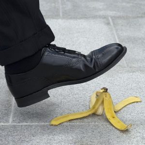 man about to step on a banana peel