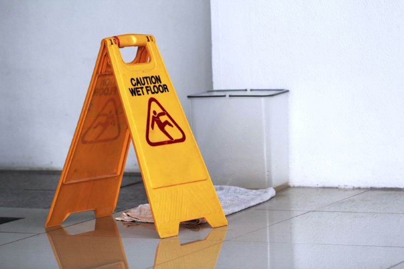 Wet floor sign in an office building